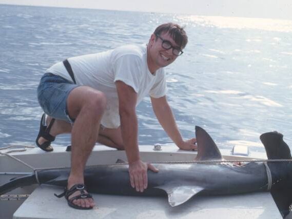 Young Jeff with a hammerhead on deck