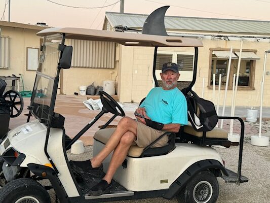 Jeff on shark golf cart